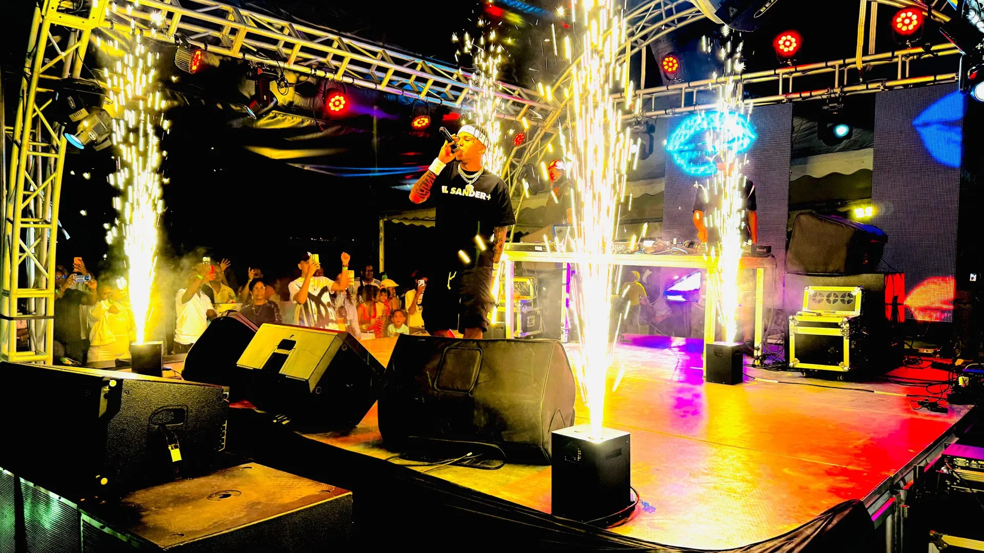 Concert stage with pyrotechnic spark fountains and truss lighting produced by Verso in Mauritius